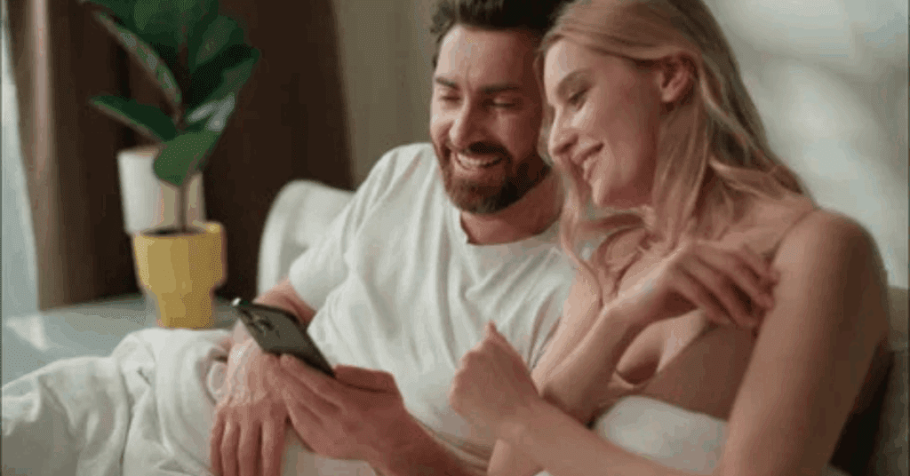 couples scrolling through their phone day after the wedding